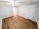 This spacious bedroom features vinyl floors, ceiling fan and ample closet space at 6025 Ashbury Ln, Cumming, GA 30028