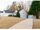 Charming single-Gathering home featuring a two-car garage and well-maintained landscaping at 6025 Ashbury Ln, Cumming, GA 30028