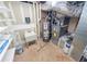 Utility room includes a utility sink and HVAC equipment at 6025 Ashbury Ln, Cumming, GA 30028