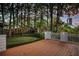 Large backyard deck with a putting green, perfect for outdoor entertaining at 121 17Th Ne St, Atlanta, GA 30309