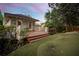 Back deck with artificial turf, manicured landscaping and privacy fence at 121 17Th Ne St, Atlanta, GA 30309