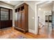 Hallway featuring hardwood floors, natural light, and an armoire at 121 17Th Ne St, Atlanta, GA 30309