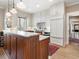 Kitchen view highlighting white and wood cabinetry, granite countertops, and stainless steel appliances at 121 17Th Ne St, Atlanta, GA 30309