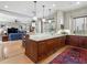 Open kitchen with granite counters, custom cabinets, and an island, perfect for modern living and entertaining at 121 17Th Ne St, Atlanta, GA 30309