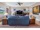 Cozy living room featuring a comfortable sofa, hardwood floors, and stylish decor at 121 17Th Ne St, Atlanta, GA 30309