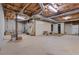 Unfinished basement with exposed ceiling, concrete flooring, and plenty of storage space at 17 Vickers Pl, Douglasville, GA 30134