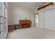 Versatile bonus room featuring neutral walls, carpet flooring, a piano and a window at 17 Vickers Pl, Douglasville, GA 30134
