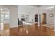 Open-concept living area with fireplace, hardwood floors, and seamless flow to the kitchen at 17 Vickers Pl, Douglasville, GA 30134