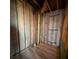 Basement corner with studded walls and plumbing lines, offering an opportunity for a bathroom addition at 1935 Manor Pointe Dr, Cumming, GA 30041