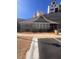 Charming community clubhouse with ample parking, showcasing the welcoming atmosphere of High Pointe View at 1935 Manor Pointe Dr, Cumming, GA 30041
