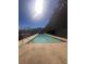 The clear waters of the community pool provide a serene escape with views of the surrounding landscape at 1935 Manor Pointe Dr, Cumming, GA 30041