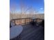 View from the deck features a table and chairs, perfect for relaxing and entertaining at 1935 Manor Pointe Dr, Cumming, GA 30041