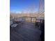 Outdoor deck featuring a dining area, ideal for entertaining and enjoying scenic views at 1935 Manor Pointe Dr, Cumming, GA 30041