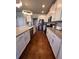 Spacious kitchen showcases granite counters, stainless appliances, and ample cabinet space at 1935 Manor Pointe Dr, Cumming, GA 30041