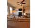 Comfortable living room with fireplace, tv, shelving and large windows for natural light at 1935 Manor Pointe Dr, Cumming, GA 30041