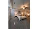 Large main bedroom with ceiling fan and ample space, offering a serene and inviting retreat at 1935 Manor Pointe Dr, Cumming, GA 30041