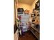 Well-organized pantry with plenty of shelving for ample food and supply storage at 1935 Manor Pointe Dr, Cumming, GA 30041