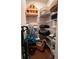 Well-organized walk-in closet featuring multiple shelves perfect for storing clothes, baskets, and decorative items at 1935 Manor Pointe Dr, Cumming, GA 30041