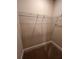 Uncluttered walk-in closet featuring wire shelving and neutral-colored walls ready for your wardrobe at 1935 Manor Pointe Dr, Cumming, GA 30041