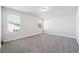 Spacious bedroom with two windows for natural light and neutral carpet at 2808 Blandwood Rd, Marietta, GA 30064