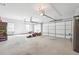 Spacious two-car garage with overhead lighting, two garage doors, and ample storage space at 2808 Blandwood Rd, Marietta, GA 30064