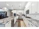 Stylish kitchen featuring granite countertops, white cabinets, and stainless steel appliances at 2808 Blandwood Rd, Marietta, GA 30064