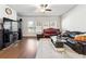 Bright living room featuring hardwood floors, large windows, and a stylish decor at 2808 Blandwood Rd, Marietta, GA 30064