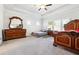 Large main bedroom with tray ceilings, two beds, and a decorative mirror at 2808 Blandwood Rd, Marietta, GA 30064
