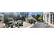 A panoramic view of the backyard oasis, complete with pool, pool house, and outdoor seating areas at 3980 Saint Elisabeth Sq, Duluth, GA 30096