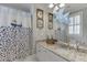 Bright bathroom featuring granite countertops, white cabinets, and blue boat shower curtain at 3980 Saint Elisabeth Sq, Duluth, GA 30096