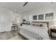 Bright bedroom featuring a kitchenette, stylish decor, and a cozy ambiance, providing a comfortable living space at 3980 Saint Elisabeth Sq, Duluth, GA 30096