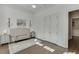 Bright bedroom featuring a neutral color palette, with large windows, and hardwood floors at 3980 Saint Elisabeth Sq, Duluth, GA 30096