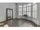 Bedroom boasts hardwood floors, plantation shutters and abundant natural light, creating a serene space at 3980 Saint Elisabeth Sq, Duluth, GA 30096