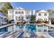 Elegant home exterior featuring a pool, complemented by well-manicured lawns and detailed architectural finishes at 3980 Saint Elisabeth Sq, Duluth, GA 30096