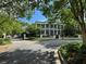 Elegant home featuring a brick driveway and a manicured lawn at 3980 Saint Elisabeth Sq, Duluth, GA 30096