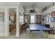 The game room features a ping pong table, a wet bar, and unique decor at 3980 Saint Elisabeth Sq, Duluth, GA 30096