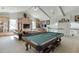 Spacious game room with a pool table, upper level access, and comfortable seating at 3980 Saint Elisabeth Sq, Duluth, GA 30096