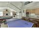 Spacious game room with a pool table, ping pong table, wet bar, and plenty of room at 3980 Saint Elisabeth Sq, Duluth, GA 30096