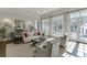 Inviting living room with hardwood floors, large windows, and comfortable seating at 3980 Saint Elisabeth Sq, Duluth, GA 30096