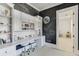 Office with built-in bookshelves and a large chalkboard wall for writing and drawing at 3980 Saint Elisabeth Sq, Duluth, GA 30096