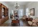 Spacious office with hardwood floors, built-in bookshelves, and natural light at 3980 Saint Elisabeth Sq, Duluth, GA 30096