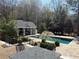 Beautiful pool with outdoor seating and a pool house, creating an ideal setting for outdoor gatherings at 3980 Saint Elisabeth Sq, Duluth, GA 30096