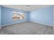 Bright bedroom with a large window offering pleasant views at 903 Bridge Se Ln, Smyrna, GA 30082