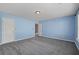 Spacious carpeted bedroom with an ensuite bathroom and walk-in closet at 903 Bridge Se Ln, Smyrna, GA 30082