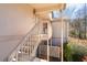 A unit entrance with stairs leading up to a covered doorway; clean and well maintained at 903 Bridge Se Ln, Smyrna, GA 30082