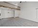 Expansive living room with high ceilings, neutral carpet, dining area, and easy kitchen access at 903 Bridge Se Ln, Smyrna, GA 30082