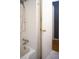 This bathroom features a bathtub, tiled walls, and new fixtures at 1263 Briarcliff Ne Rd, Atlanta, GA 30306