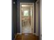 Neutral-toned bathroom with pedestal sink, toilet, window and tile flooring at 1263 Briarcliff Ne Rd, Atlanta, GA 30306