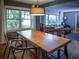 Elegant dining room featuring hardwood floors, modern lighting, and a spacious layout perfect for entertaining guests at 1263 Briarcliff Ne Rd, Atlanta, GA 30306