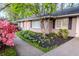 Charming home with manicured landscaping, colorful azaleas, and a well-maintained walkway for added curb appeal at 1263 Briarcliff Ne Rd, Atlanta, GA 30306